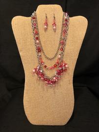 Hot pink elaborately beaded and silver chain necklace and earring set 202//269