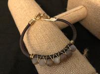 Brown leather and bead bracelet 202//151